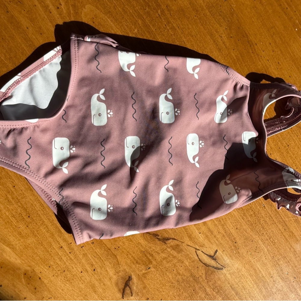 Adorable one piece swimsuit from Portugal. Matching sun hat. 1/2 year size
